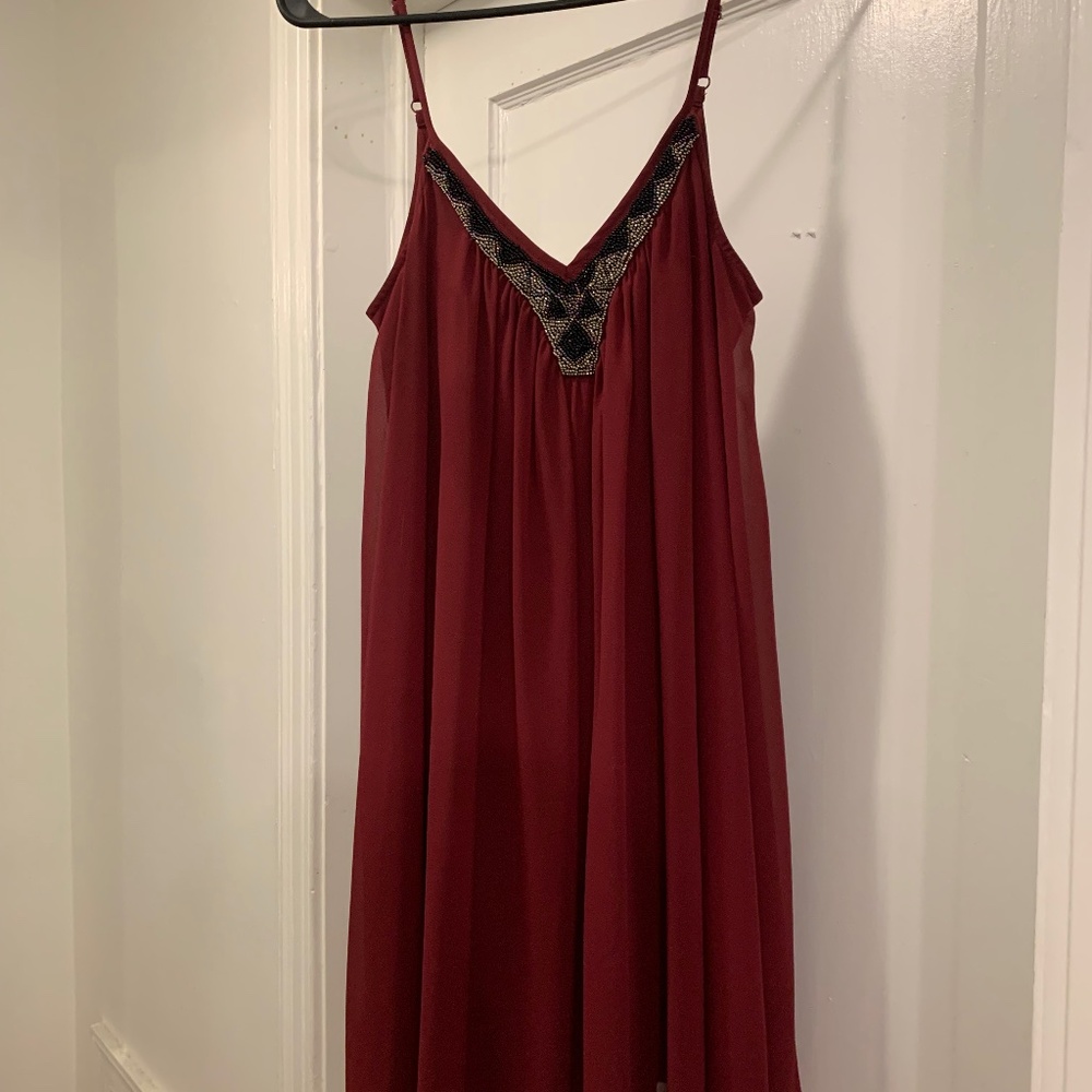 Short spaghetti strap beaded detail flounce dress